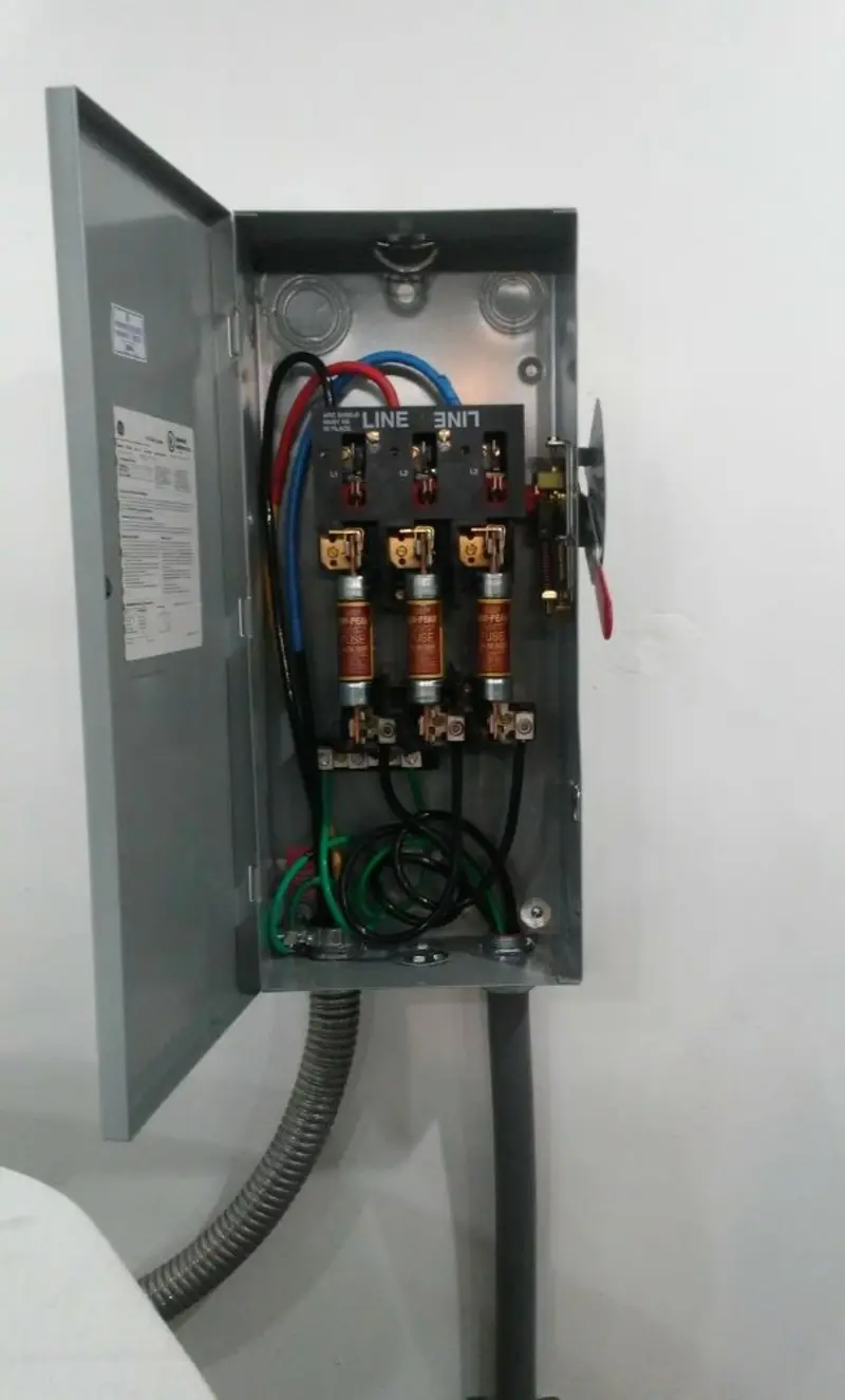 Three-phase disconnect switch installed for Smoke Detector Installation in Grafton